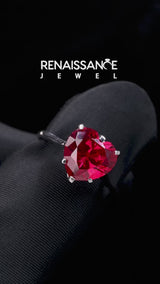 Silver Heart Cut Ruby Solitaire Ring with Flower Prong Setting and Classic Band