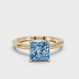Yellow gold Fancy Blue Princess Cut Diamond Solitaire Ring with Six-Prong Setting and Classic Band