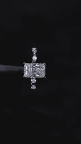 Platinum Radiant Solitaire Diamond Ring with Bezel Set Side Stones and Prong Setting