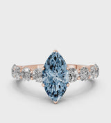 Rose gold Fancy Blue Marquise Cut Diamond Prong Setting with Side Stones on a Pave Band