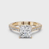 Yellow gold Princess Cut Solitaire Diamond Engagement Ring with Pave Band and Four-Prong Setting
