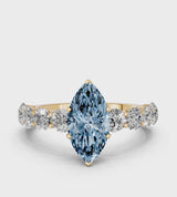 Yellow gold Fancy Blue Marquise Cut Diamond Prong Setting with Side Stones on a Pave Band