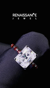 White gold Radiant Cut Diamond Ring with Marquise and Round with Garnet side stone Side Stones and Four-Prong Setting