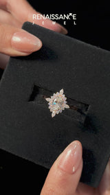 Rose gold Oval Halo Diamond Cluster Ring with Marquise and Round Stones on a White Gold Band with Prong Setting