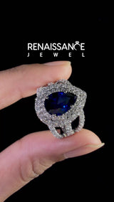 Platinum Pear Cut Blue Sapphire Double Halo Ring with Round Pavé Split Shank and Prong Setting