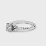 Platinum Cushion Cut Diamond Solitaire Ring with Side Stones and Four-Prong Setting