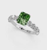 Platinum Fancy Green Radiant Cut Diamond Prong Setting with Side Stones on a Pave Band