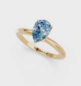 Yellow gold Fancy Blue Pear Cut Diamond Solitaire Ring with Six-Prong Setting and Classic Band