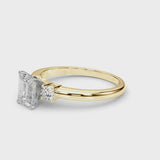 Yellow gold Three-Stone Emerald Cut Diamond Solitaire with Prong Setting and Classic Band