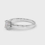 Platinum Oval Solitaire Diamond Engagement Ring with Four-Prong Setting on a Classic Band