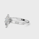 Platinum Marquise Cut Diamond Solitaire with Side Baguettes and Channel Set Band
