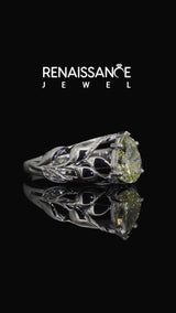 Platinum Fancy Yellow Pear Cut Diamond Leaf-Inspired Engagement Ring with Round Accents and Prong Setting