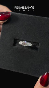 Platinum Three-Stone Cushion Cut Brilliant Diamond Solitaire Ring with Tapered Band and Four-Prong Setting