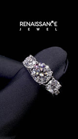 White gold Round Cut Diamond Three-Stone Ring with Channel Set Band and Four-Prong Setting