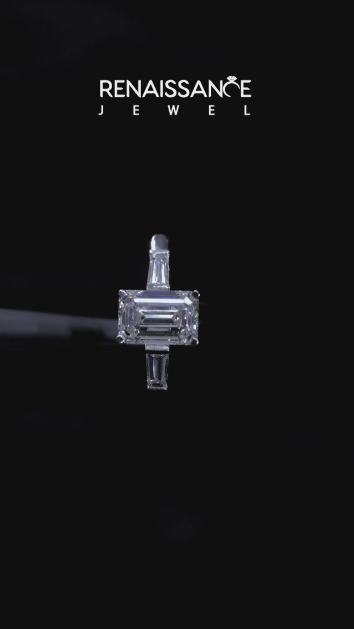 Silver Emerald Solitaire with Tapered Baguette Side Stones on a Classic Band with Four-Prong Setting 5