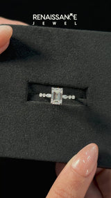 Platinum Emerald Cut Diamond Ring with Marquise and Round  Side Stones and Four-Prong Setting