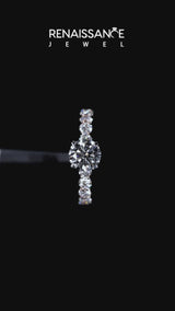 Rose gold Round Cut Diamond Prong Setting with Side Stones on a Pave Band