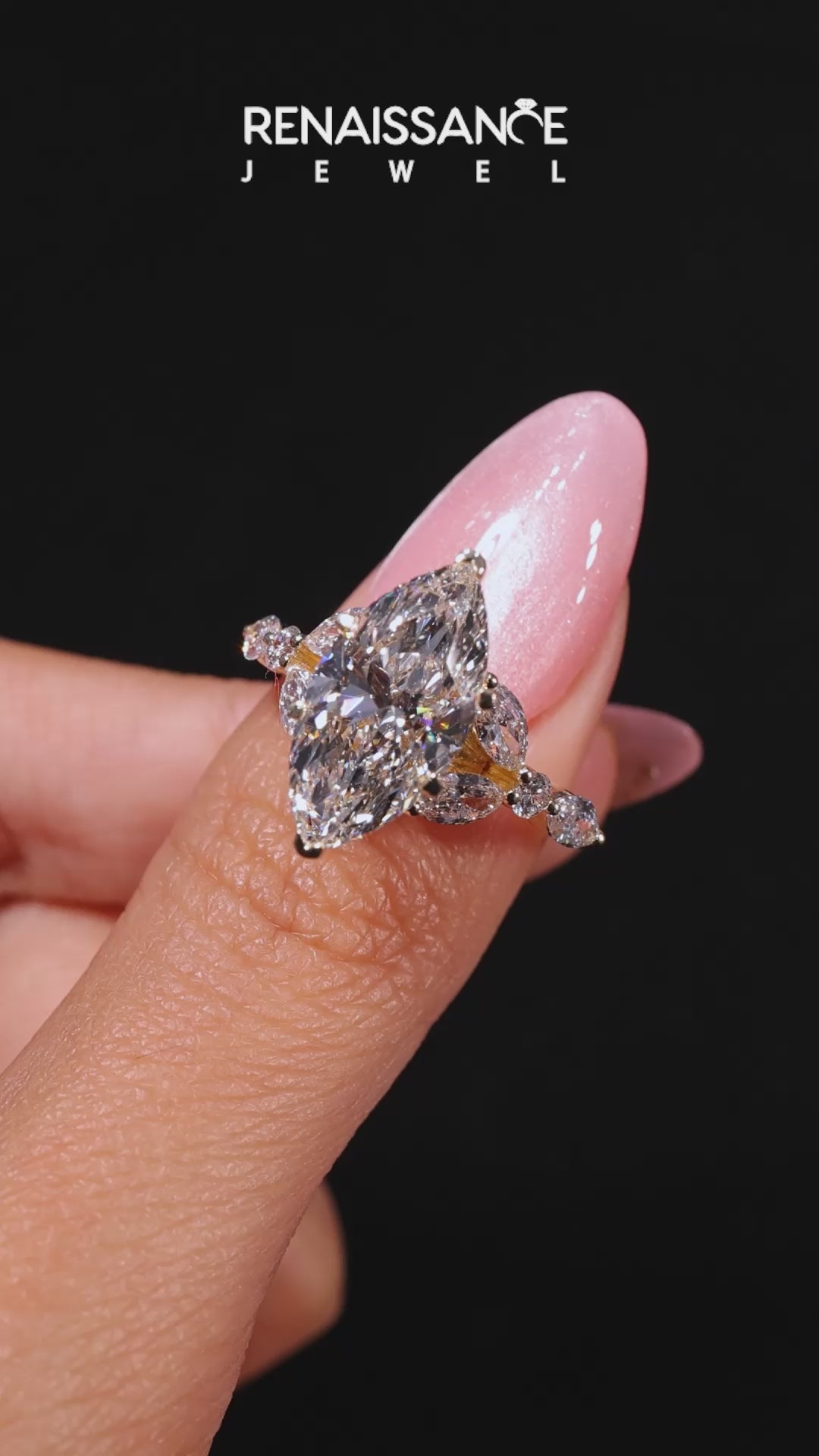 Yellow gold Marquise Diamond Solitaire with Side Stones on a White Gold Band and Four-Prong Setting_21