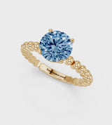 Yellow gold Fancy Blue Round Cut Diamond Solitaire Ring with Beaded Band and Prong Setting