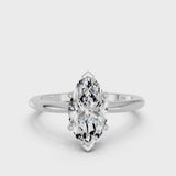 Silver Marquise Cut Diamond Solitaire Ring with Six-Prong Setting and Classic Band