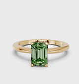 Yellow gold Fancy Green Emerald Cut Diamond Solitaire Ring with Six-Prong Setting and Classic Band