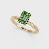 Yellow gold Fancy Green Emerald Cut Diamond Solitaire Ring with Six-Prong Setting and Classic Band