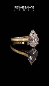 Yellow gold Pear Solitaire Engagement Ring with Six-Prong Setting and Tapered Band