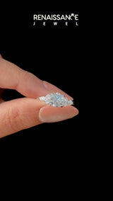White gold Emerald Cut Brilliant Diamond Solitaire Ring with Pear Side Stones and Four-Prong Setting