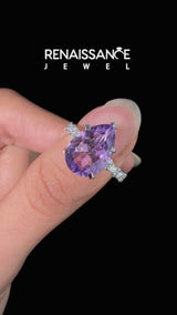 Silver Pear Cut Amethyst Side Stone Solitaire Ring with Round and Four-Prong Setting