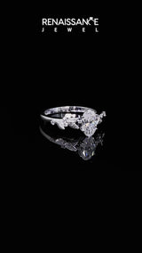 White gold Oval Cut Diamond Solitaire Ring with Leaf Motif Band and Four-Prong Setting