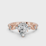 Rose gold Pear Solitaire Twisted Band with Prong Setting