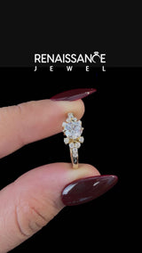 Yellow gold Round Cut Diamond Ring with Side Stones and Four-Prong Setting