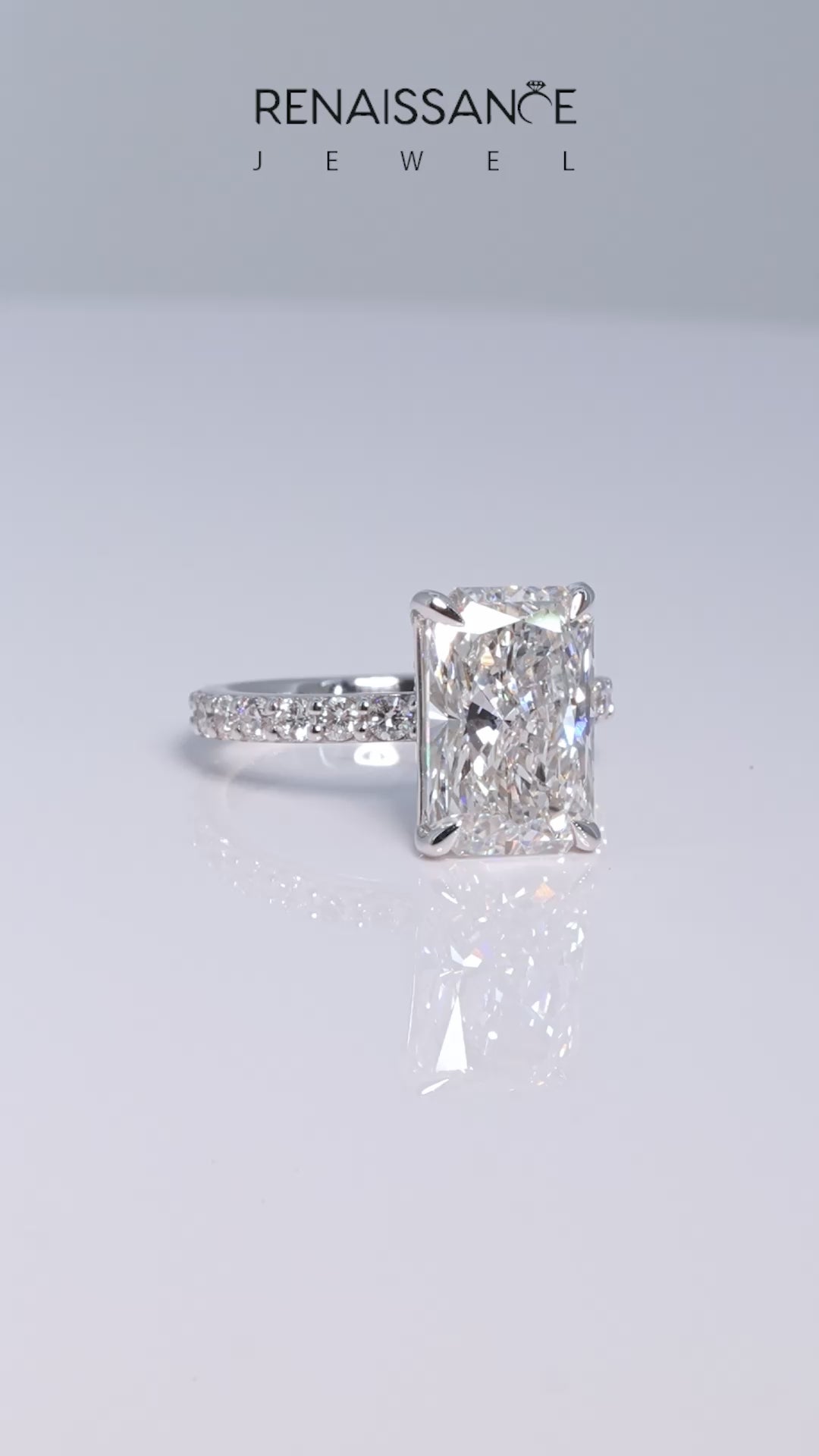 Platinum Radiant Cut Diamond Ring with Pavé Band and Four-Prong Setting_48