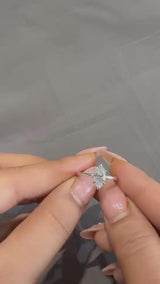 Silver Marquise Solitaire Engagement Ring with Cathedral Band and Four-Prong Setting
