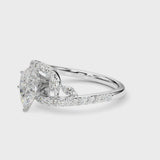 White gold Pear Solitaire with Pavé Twist Band and Four-Prong Setting