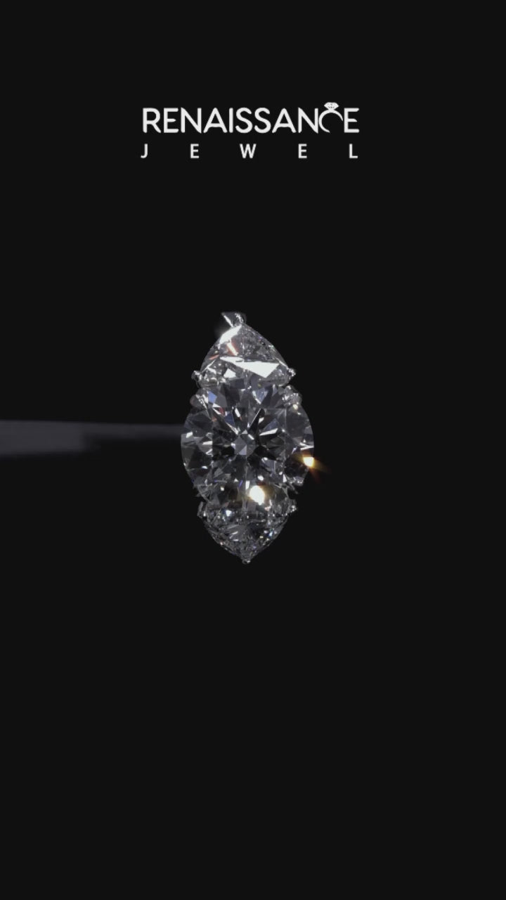 Silver Three-Stone Round Diamond Ring with Pear Side Stones on a Platinum Band with Four-Prong Setting 6