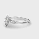 Silver Marquise Solitaire with Tapered Baguette Side Stones on a Classic Band with Four-Prong Setting