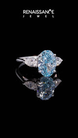 Silver Fancy Blue Oval Cut Diamond Three-Stone Ring with Pear  Side Stones and Prong Setting