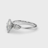 White gold Three-Stone Marquise Cut Diamond Ring with Pear Side Stones and Four-Prong Setting