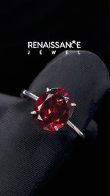 Silver Oval Cut Garnet Solitaire Engagement Ring with Classic Band and Four-Prong Setting