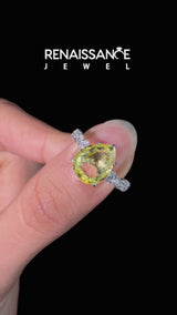 Silver Pear Cut Yellow Sapphire Side Stone Solitaire Ring with Round and Four-Prong Setting