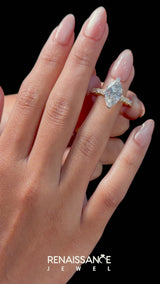 Yellow gold Marquise Cut Diamond Side Stone Solitaire Ring with Round  and Four-Prong Setting