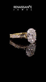 Yellow gold Oval Cut Diamond Solitaire with Side Baguettes and Channel Set Band