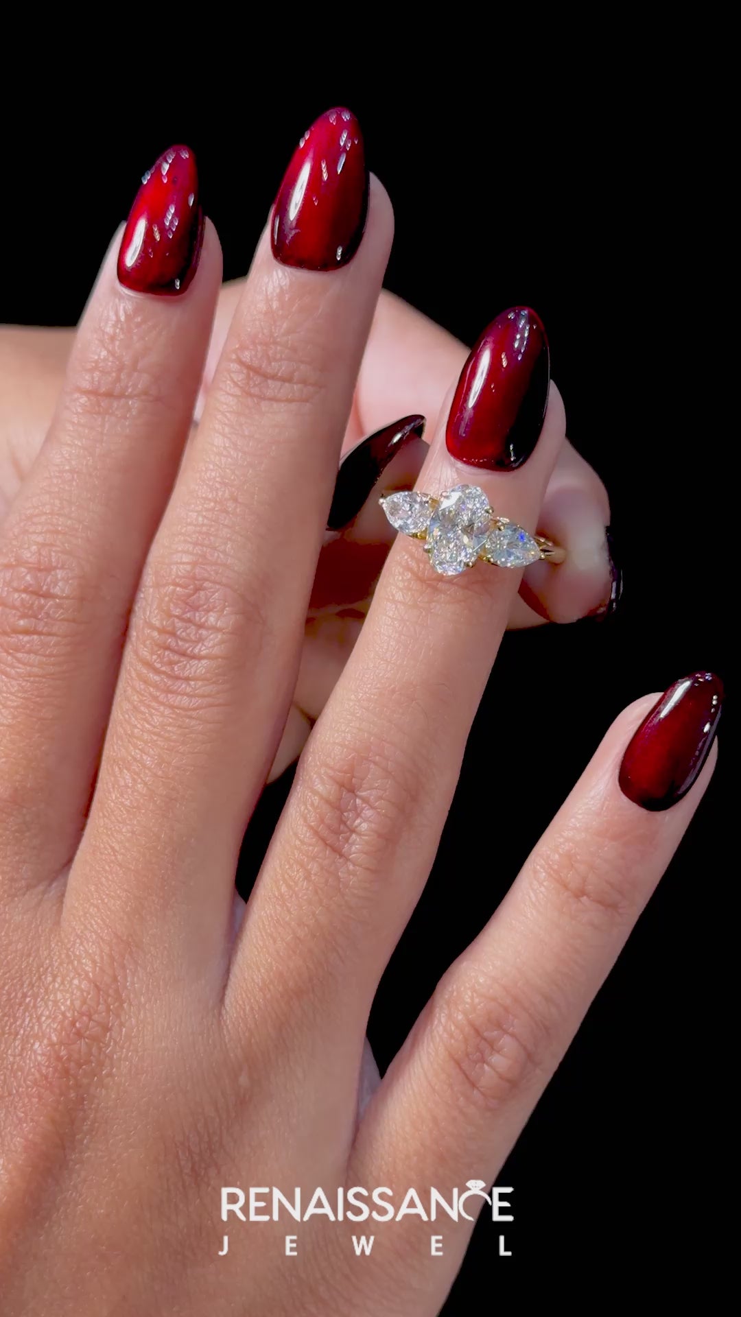 Yellow gold Three-Stone Oval Diamond Solitaire Ring with Pear Side Stones and Four-Prong Setting_25