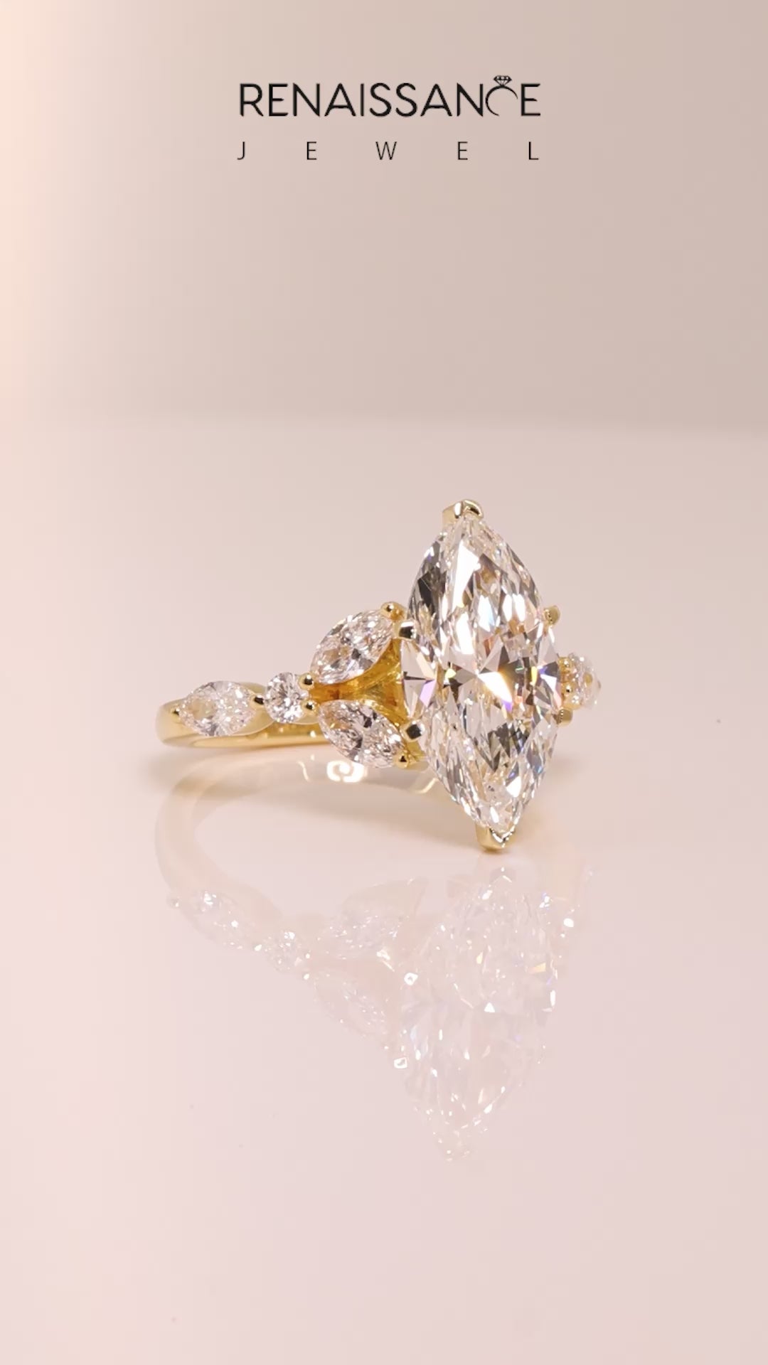 Yellow gold Marquise Diamond Solitaire with Side Stones on a White Gold Band and Four-Prong Setting_19