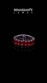 White gold Emerald Cut Ruby Eternity Band with Shared Prong Setting