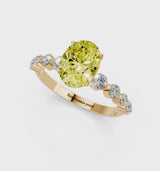 Yellow gold Fancy Yellow Oval Cut Solitaire Diamond Ring with Pave Band and Four-Prong Setting