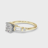 Yellow gold Cushion Cut Diamond Ring with Baguette Side Stones, Channel Set Band, and Four-Prong Setting