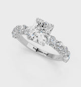 Platinum Radiant Cut Diamond Prong Setting with Side Stones on a Pave Band
