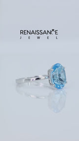 Silver Oval Cut Blue Topaz Solitaire Engagement Ring with Classic Band and Four-Prong Setting